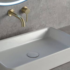 Washbasin with goldcoloured cp basin tap